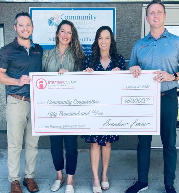 SCC make donation to Community Cooperative