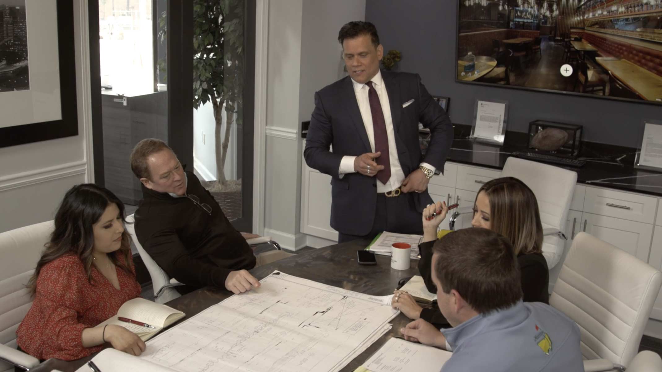 Team of experts discuss issues with a building after the storm